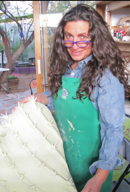 April 2014 Photo of me showing off the largest heart ever made in my studio, before the 2nd glaze firing