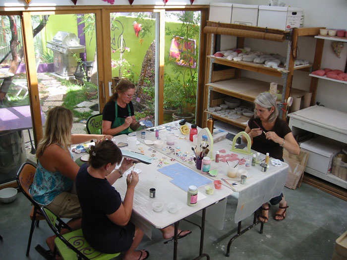 Four Participants Glazing in the Studio